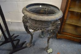 A good large pair of cast bronze planters supported on three curving legs.