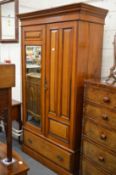A Victorian walnut wardrobe.