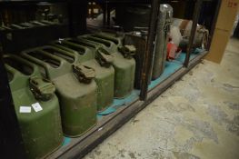 Quantity of jerry cans and other related items.