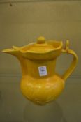 A Chinese yellow glazed lidded ewer.