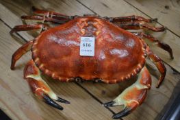 An unusual painted cast iron crab shaped box with hinged cover.