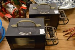 Two Negretti and Zambra barographs.