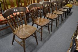 A set of six spindle back kitchen chairs.