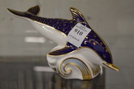 A Royal Crown Derby model of a dolphin.