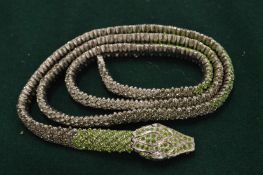 A Valentino snake necklace.