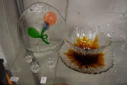 A decorative amber tinted moulded glass bowl and stand and other glassware.