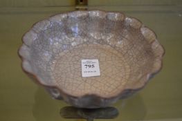 A Chinese lobed form crackle glazed brush washer or bowl.