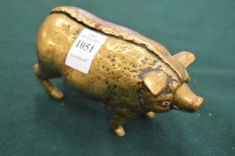 A cast brass pig table bell (tail broken).