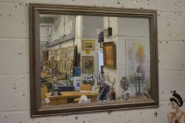 Rectangular mirror with silver painted frame.