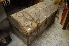 An early metal studded pine dome top trunk.