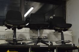 A quantity of office swivel chairs.