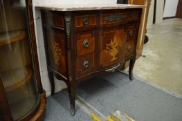 A French style mahogany, marquetry and ormolu mounted marble top three drawer commode.