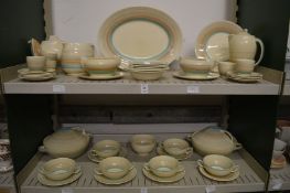A large quantity of Susie Cooper pastel banded dinnerware.