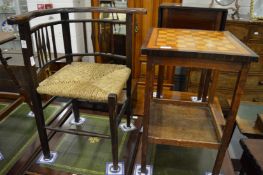 A rush seated corner armchair and occasional table with chess board inset top.