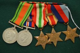 A set of five military medals.
