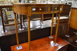 A small yew wood two drawer side table.