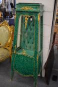 An unusual faux malachite and ormolu mounted narrow vitrine cabinet.