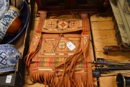 An embossed leather bag.