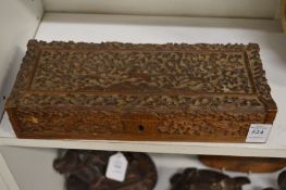 An Indian carved sandal wood casket.