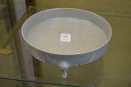 A Chinese green celadon glazed circular brush washer.