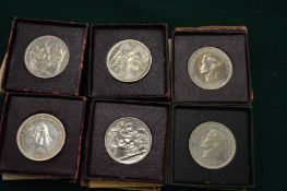 A collection of Festival of Britain medals.