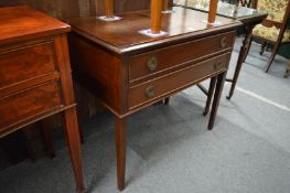 A mahogany two drawer table.