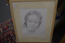 A group of head studies depicting children and young men.