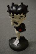 A painted cast iron Betty Boop doorstop.