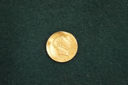 A small gold coin.