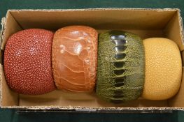 A group of four Cuckoo Moment decorative bangles.