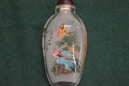 A Chinese interior painted brass snuff bottle.