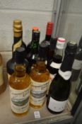 Two bottles of blended Scotch whisky and other items to include a bottle of Calvados.