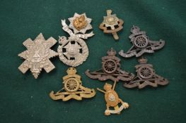 Various military badges.