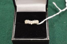 A 14ct gold and dress ring.