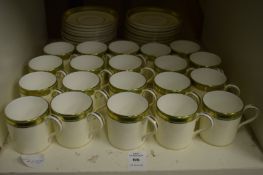 A quantity of Minton coffee cans and saucers.