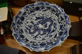 A large Chinese blue and white dragon dish.