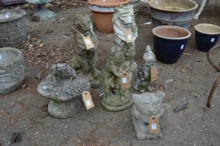 Six various garden ornaments.