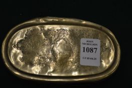 An old brass tobacco box.