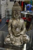A seated Buddha.