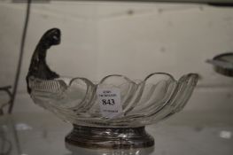 A cut glass leaf shaped dish with continental white metal mounts.
