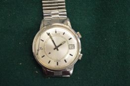 A Jaeger Le Coultre stainless steel wristwatch (faults).