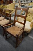 A 19th century rush seated rocking chair.
