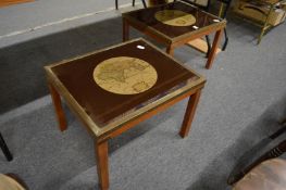 A pair of brass framed map of the world coffee tables.