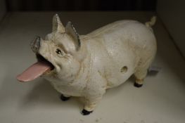 An amusing cast iron pig.