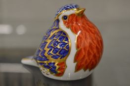 A Royal Crown Derby model of a robin.