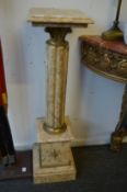 A pair of marble columns or pedestals.