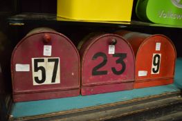 Three American style painted metal post boxes.