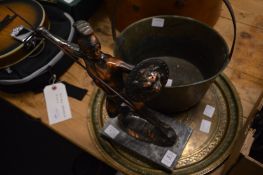 Cast metal model of a centurion, an Eastern brass charger and a brass preserve pan.