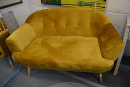 A good small gold plush upholstered settee.