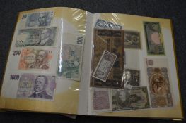 A good collection of bank notes, various countries, housed in an album.